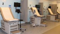 Simulation Center room with hospital beds for clinical skills practice.